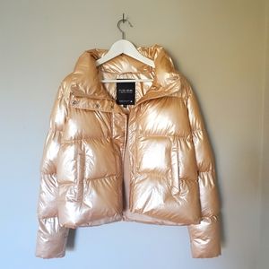 Metallic puffer coat by Noize